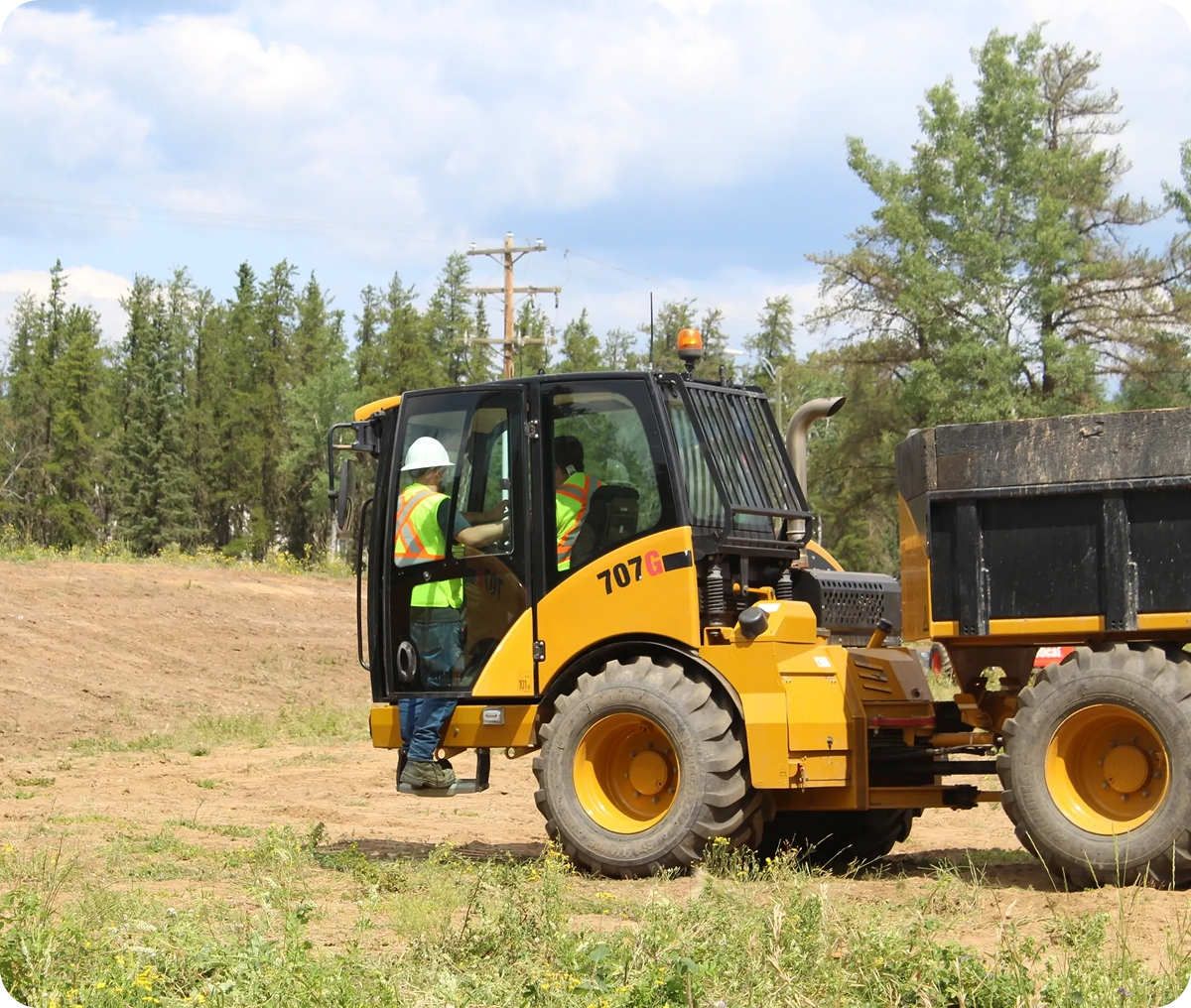 Heavy machinery in a forested area